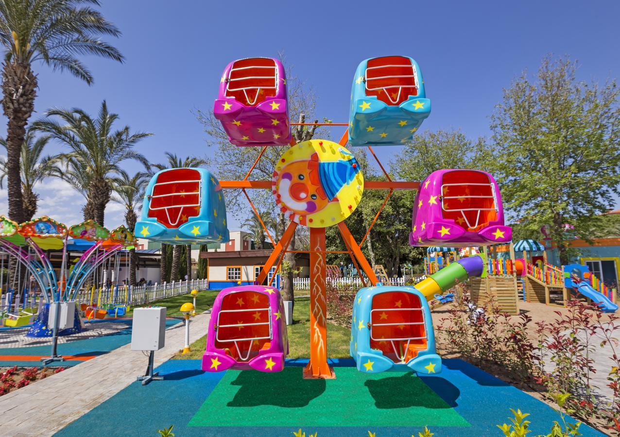 Ic Hotels Green Palace - Kids Concept Antália Exterior foto A ferris wheel at a children's park